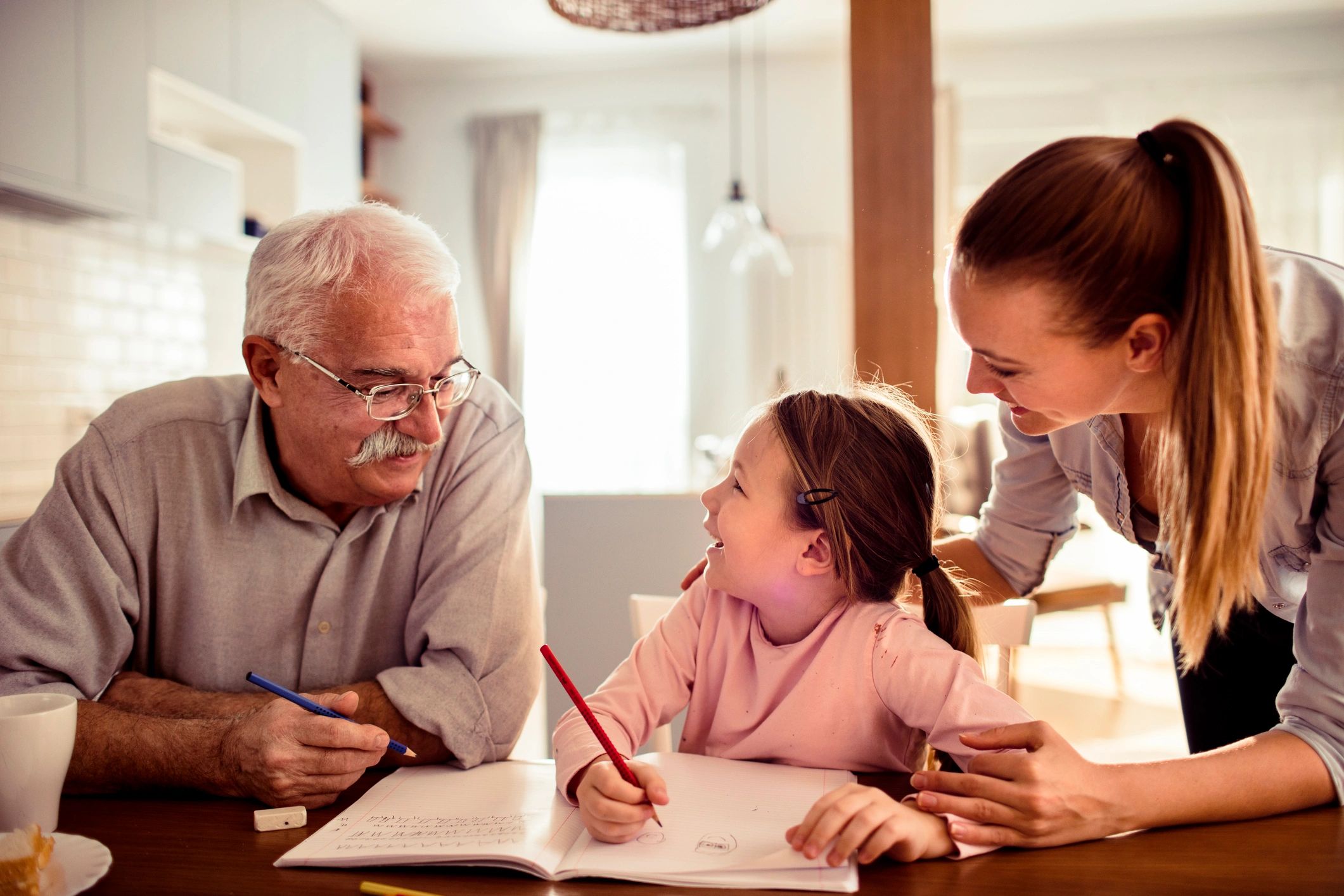 Family learning together at care home