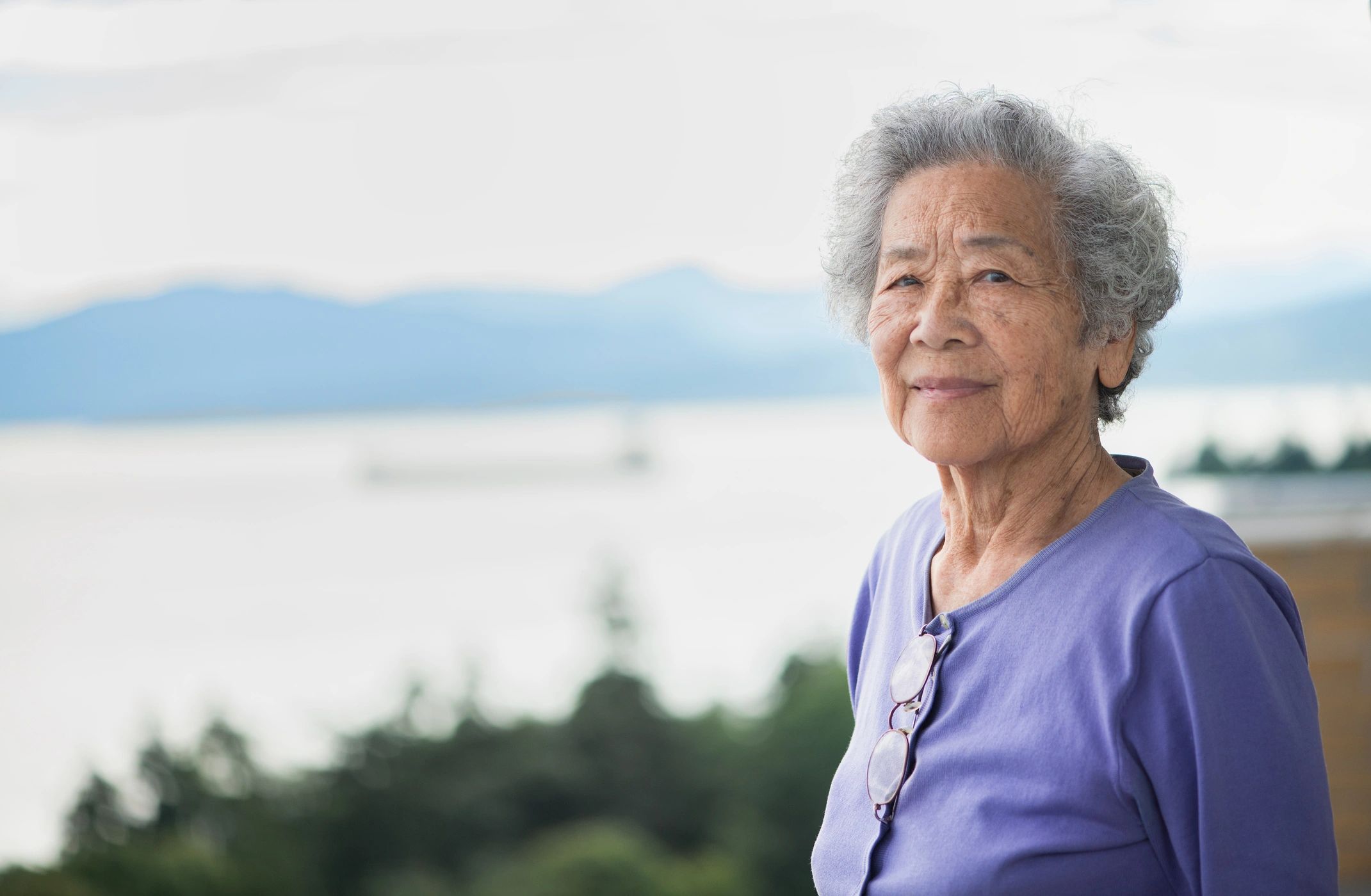 smiling elderly woman care home